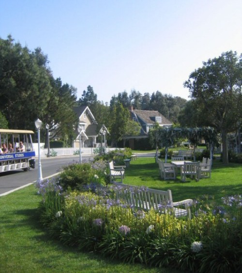 dh_wisterialane2 A sight seeing troley shows visitors around Wisteria Lane in Universal Studios. In the background Mike and Bree's house