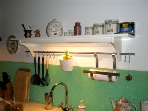 Love the eclectic clutter! Check the Franch vintage jars!