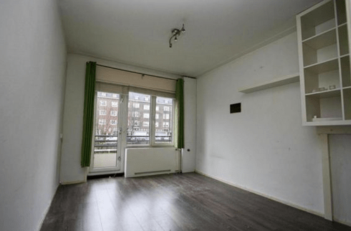 The door leads to a balcony overlooking the canal